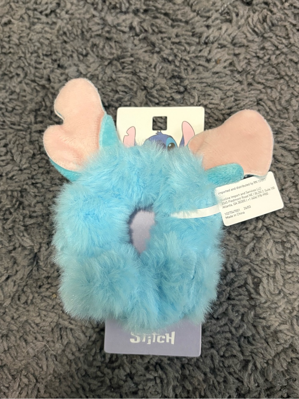 NWT Disney’s Stitch blue with pink ears fuzzy hair tie